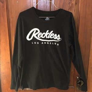 Black long sleeve reckless shirt